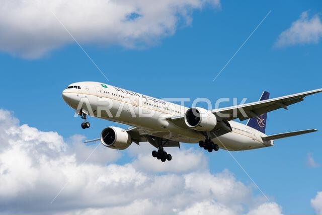 Saudia, Saudi Arabian Airlines, Boeing 777-300/ER jet airliner plane HZ-AK41 on finals to land at London Heathrow Airport, UK. Saudi long haul flight