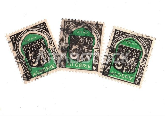 Vintage postage stamps from  Algeria isolated on a white background.
