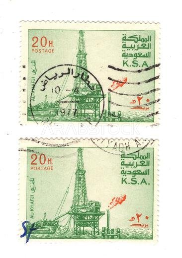 Vintage postage stamps from Saudi Arabia isolated on a white background. Vintage postage stamps from Saudi Arabia isolated on a white background.
