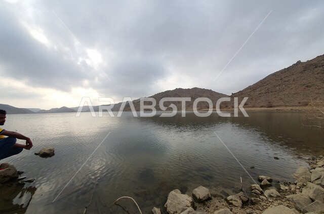 Creative image of a lake in the middle of the mountainous areas in the city of Jeddah, Saudi Arabia, beautiful landscapes, Hiking Jeddah, Hiking Saudi Arabia, hiking in Jeddah, tourist attractions, tourism in Saudi Arabia