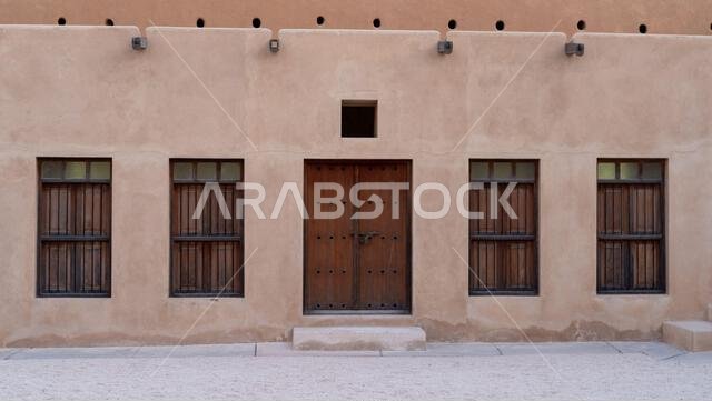 doha, qatar-November 01,2023 : old doors and windows at the historic zubarah fort.