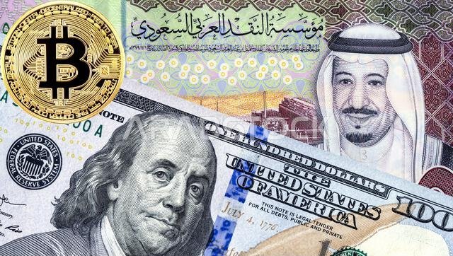 American dollars banknote with Benjamin Franklin and Saudi Arabia banknote with King Salman. Business concept photo of the exchange rate, stock exchan