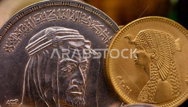 An old vintage retro silver one 1 LE EGP Egyptian pound with a bust of King Faisal Bin AbdulAziz Al Saud as a commemoration after his death, with an E An old vintage retro silver one 1 LE EGP Egyptian pound with a bust of King Faisal Bin AbdulAziz Al Saud as a commemoration after his death, with an E