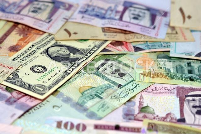 معلومات أساسية عن العملة السعودية (الريال السعودي) والدولار الأمريكي، وسعر صرف العملات الأمريكية والسعودية، والوضع الاقتصادي