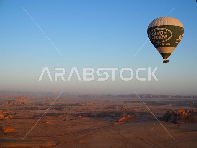 Hot air balloon over Hegra, Saudi Arabia