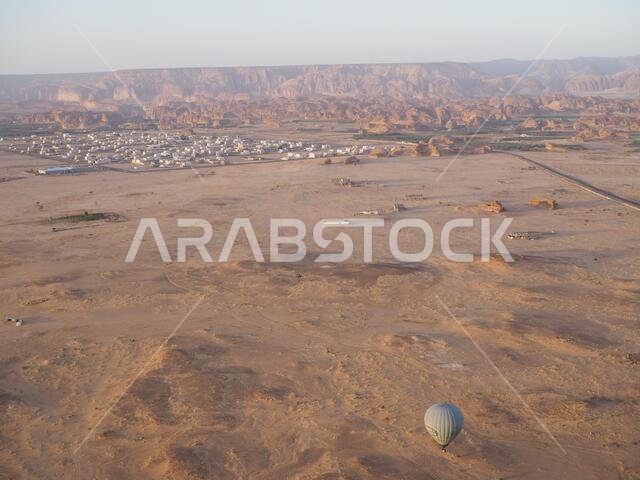 Hot air balloon over Hegra, Saudi Arabia