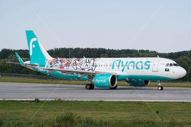 Saudi airline's Flynas Airbus A320 NEO in a "Year of Arabic Calligraphy" livery taxiing for takeoff from Lviv Airport