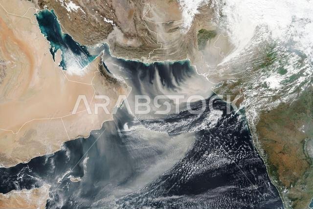 Satellite view of plumes of dust streaming from Oman, Pakistan and Iran, into the Arabian Sea.