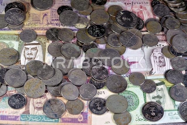 عملات الريال السعودي، أوراق نقدية وعملات معدنية من عصور مختلفة من المملكة العربية السعودية، عملات سعودية قديمة عتيقة، قيمتها.