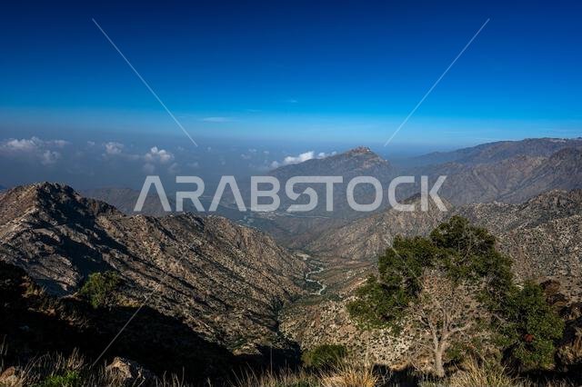 Dramatic and picturesque mountain landscape. Early morning in the Sarawat Mountains, Saudi Arabia.