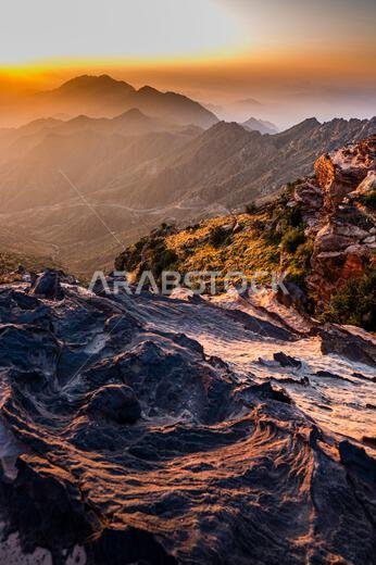 Colorful landscape background at sunrise in the Asir Mountains in Saudi Arabia.
