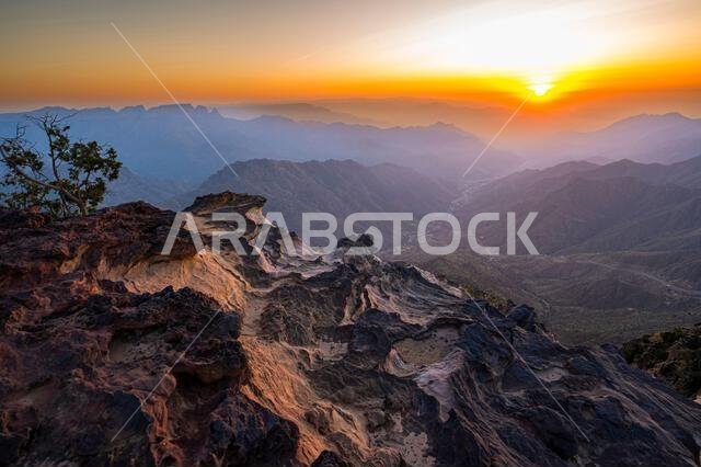 Colorful landscape background at sunrise in the Asir Mountains in Saudi Arabia.