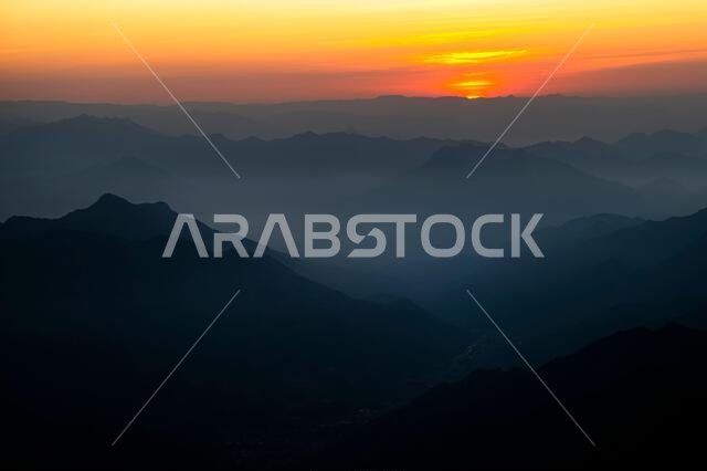 Colorful landscape background at sunrise in the Asir Mountains in Saudi Arabia.