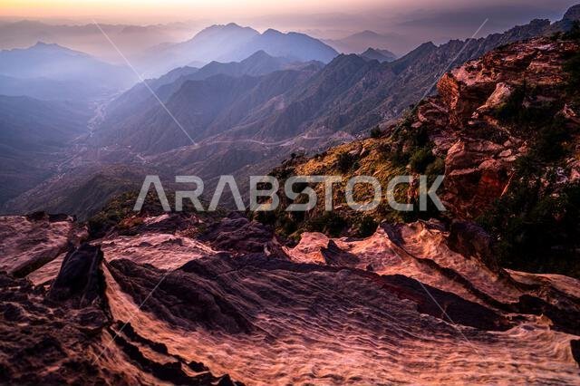 Colorful landscape background at sunrise in the Asir Mountains in Saudi Arabia. Colorful landscape background at sunrise in the Asir Mountains in Saudi Arabia.