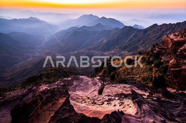 Colorful landscape background at sunrise in the Asir Mountains in Saudi Arabia.