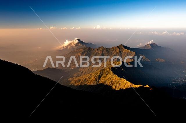 Dramatic and picturesque mountain landscape. Sunrise from Jabal Mareer. The Sarawat Mountains, Saudi Arabia.