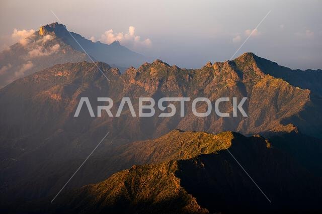 Dramatic and picturesque mountain landscape. Sunrise from Jabal Mareer. The Sarawat Mountains, Saudi Arabia.