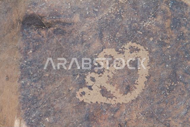 Graffiti Rock on stones in mardama mountains in town near riyadh provenience in Saudi Arabia