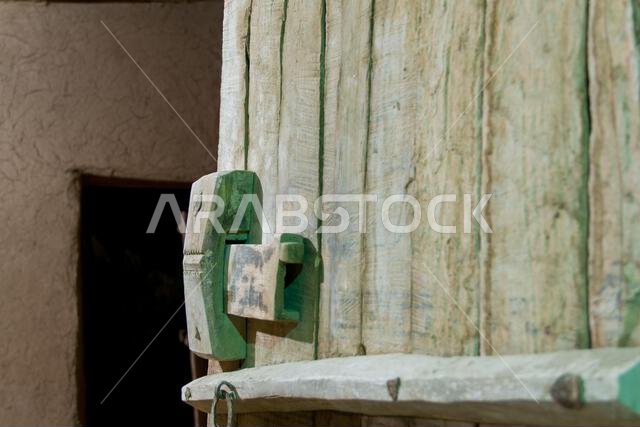 vintage woody doors and windows from arab heritage village in riyadh in Saudi Arabia