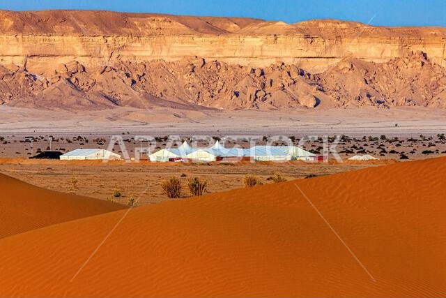 Tents in desert landscape, Saudi Arabia