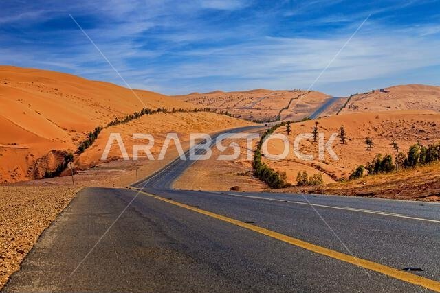 Road through desert landscape, Saudi Arabia Road through desert landscape, Saudi Arabia