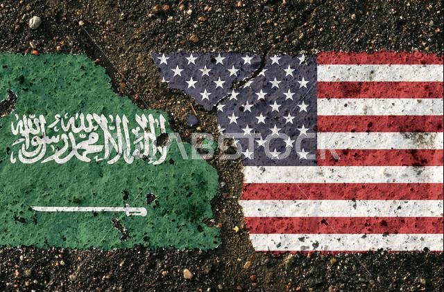 تظهر على الرصيف صور أعلام المملكة العربية السعودية والولايات المتحدة، كرمز للمواجهة. صورة توضيحية. تظهر على الرصيف صور أعلام المملكة العربية السعودية والولايات المتحدة، كرمز للمواجهة. صورة توضيحية.