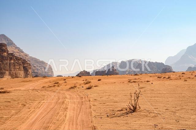 Arabian desert. Wadi Rum. Space landscape. Footprints in the sand. Filming location for many science fiction films. Arabian desert. Wadi Rum. Space landscape. Footprints in the sand. Filming location for many science fiction films.