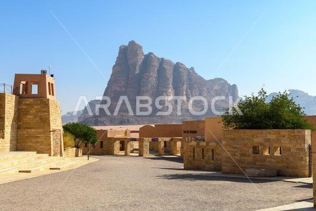 Wadi Rum, Aqaba, Jordan - December 19, 2022: View of the Seven Pillars of Wisdom rock formation from Wadi Rum Visitor Centre. Jordan, Aqaba, Arabian d