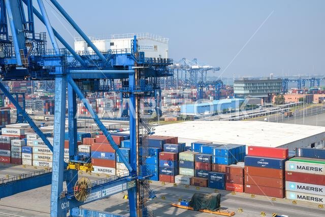 Jeddah, Saudi Arabia - December 21, 2022: Port cranes for loading containers. View of the cargo port in Jeddah.