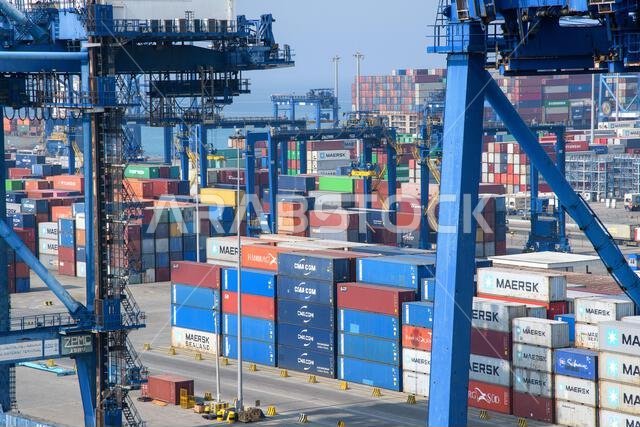 Jeddah, Saudi Arabia - December 21, 2022: Port cranes for loading containers. View of the cargo port in Jeddah.