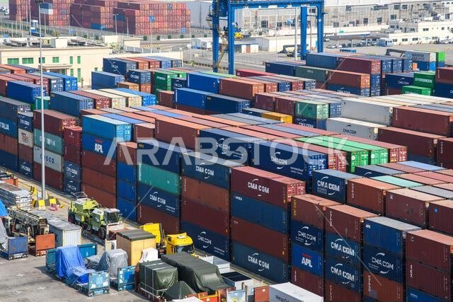 Jeddah, Saudi Arabia - December 21, 2022: Containers ready for loading. View of the cargo port in Jeddah.