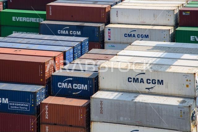 Jeddah, Saudi Arabia - December 21, 2022: Containers ready for loading. View of the cargo port in Jeddah.