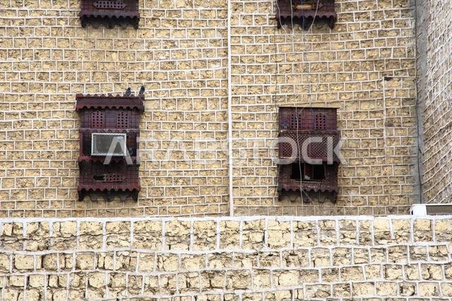 Jeddah, Saudi Arabia - December 21, 2022: Traditional house decoration. The unique architecture of the medieval Arab city. Historic Jeddah. Jeddah, Saudi Arabia - December 21, 2022: Traditional house decoration. The unique architecture of the medieval Arab city. Historic Jeddah.
