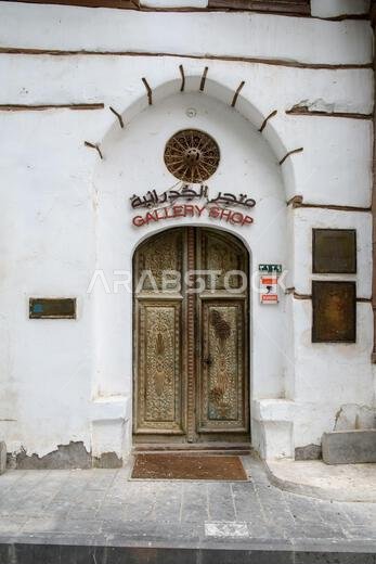 Jeddah, Saudi Arabia - December 21, 2022: Street life in the Old City. Door to the souvenir shop. Historic Jeddah. Jeddah, Saudi Arabia - December 21, 2022: Street life in the Old City. Door to the souvenir shop. Historic Jeddah.