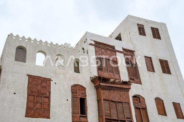 Jeddah, Saudi Arabia - December 21, 2022: Traditional house decoration. The unique architecture of the medieval Arab city. Historic Jeddah. Jeddah, Saudi Arabia - December 21, 2022: Traditional house decoration. The unique architecture of the medieval Arab city. Historic Jeddah.