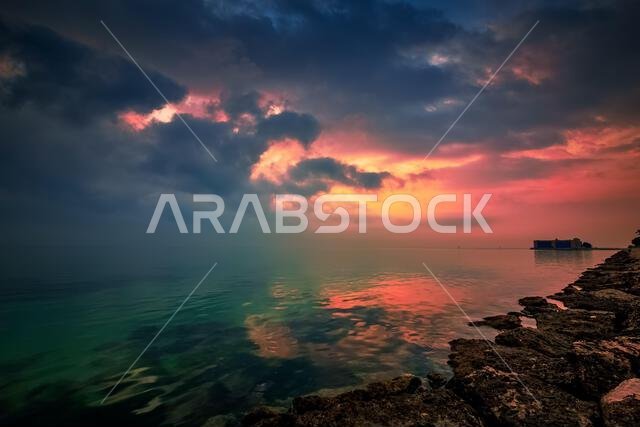 Dramatic sunrise clouds view in Alkhobar sea side Saudi Arabia. City : Khobar, Country : Saudi Arabia.