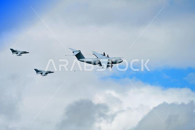 Fairford RIAT air show Saturday 15 July 2023 German Airbus A400  practise air refueling with two Panavia Tornados inbetween   showers