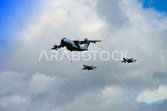 Fairford RIAT air show Saturday 15 July 2023 German Airbus  A400 practise air refueling with two Panavia Tornados inbetween   showers