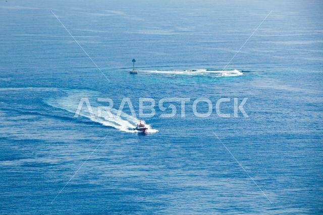 Pilot boat is on the way on a sunny day. Jeddah Islamic Seaport, Saudi Arabia