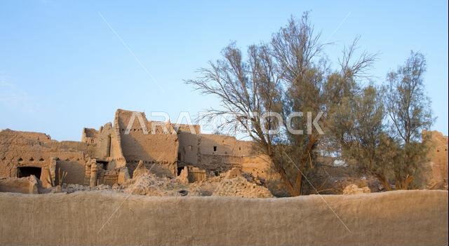 Ruins of ancient arab middle eastern old town built of mud bricks, old mosque with minaret in riyadh, saudi arabia