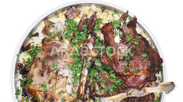 Mandi is a traditional dish from Yemen of meat, rice, and spices. It is now very popular in other areas of the Arabian Peninsula, and it is also commo