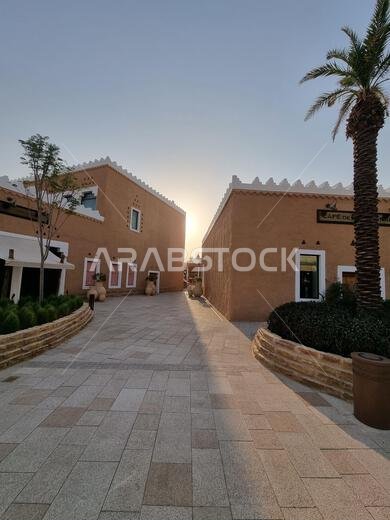 A closeup of buildings and pathway on a sunny day in Saudi Arabia
