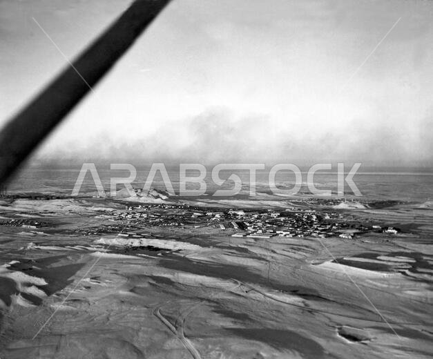 Dhahran, Saudi Arabia: February 21, 1947. An aerial view of the town of Dhahran, erected in Saudi Arabia by the Arabian-American Oil Company to house some 1500 American oil workers and their families. ARAMCO is jointly owned by the Texas Oil Company and Standard Oil of California.