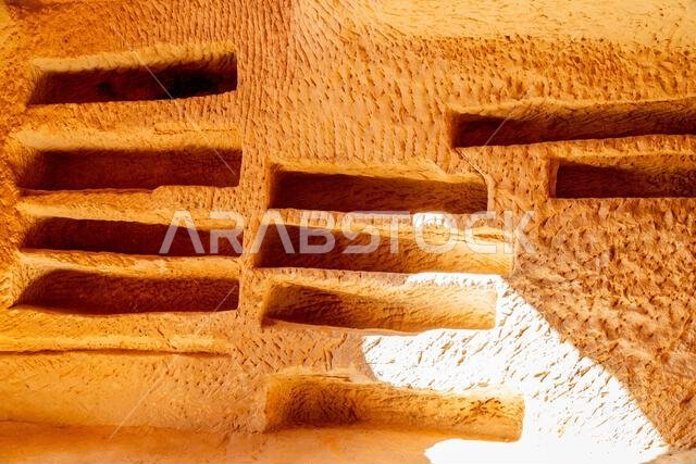 Burial places inside the ancient nabataean tomb at Jabal al banat complex of ancient tombs, Hegra, Al Ula, Saudi Arabia