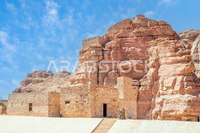 Al Ula old town street with castle walls on the hill, Medina province, Saudi Arabia