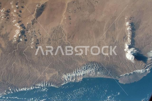 Astronaut Sultan Alneyadi flies over regions of Saudi Arabia, Riyadh, Kuwait, Bahrain, Qatar, Liwa, and the Empty Quarter, observing terrain and landscape from orbit.