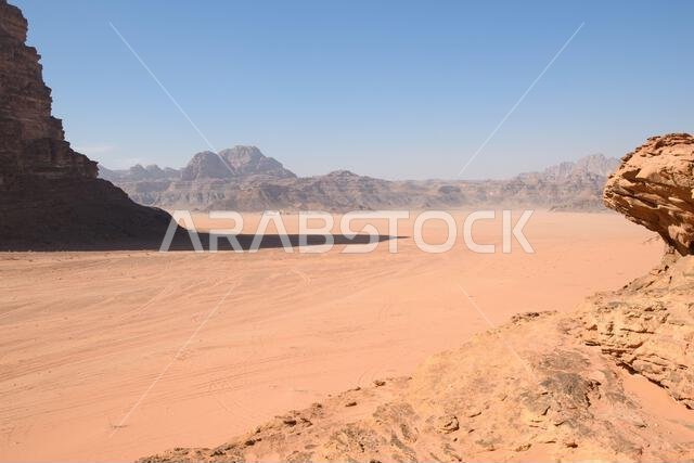 Arabian desert. Wadi Rum. Space landscape. Footprints in the sand. Filming location for many science fiction films. Arabian desert. Wadi Rum. Space landscape. Footprints in the sand. Filming location for many science fiction films.