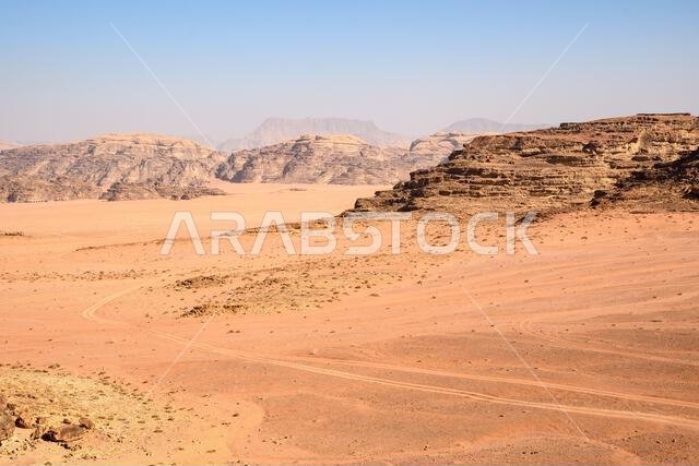 Arabian desert. Wadi Rum. Space landscape. Footprints in the sand. Filming location for many science fiction films. Arabian desert. Wadi Rum. Space landscape. Footprints in the sand. Filming location for many science fiction films.