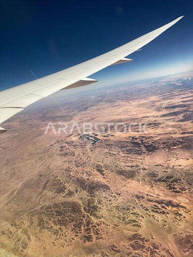 View of the desert Saudi Arabia from a Boeing 787-9 Dreamliner View of the desert Saudi Arabia from a Boeing 787-9 Dreamliner