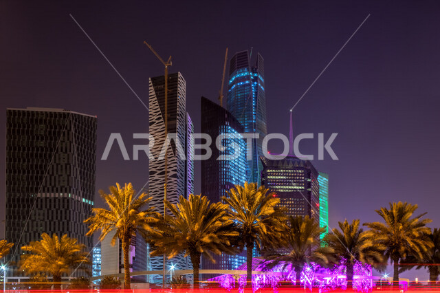 صورة ابداعية لمركز الملك عبدالله المالي ( كافد ) في الرياض بالمملكة العربية السعودية ليلا، معالم الرياض المشهورة، ابراج وناطحات سحاب، الفن الهندسي المعماري بالسعودية، السياحة في السعودية